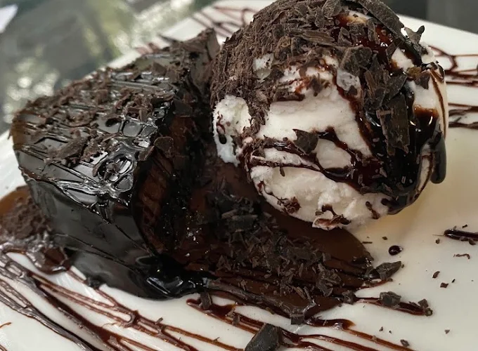 Chocolate brownie and ice cream served at Too Mikkii Tapas